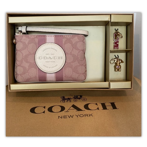 Coach Handbags - NWTCoach Dempsey Corner Zip Pink Wristlet + 2 Charms Gift Set